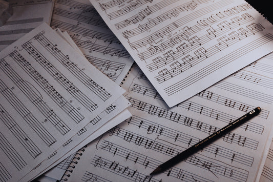 Handwritten music notes on paper