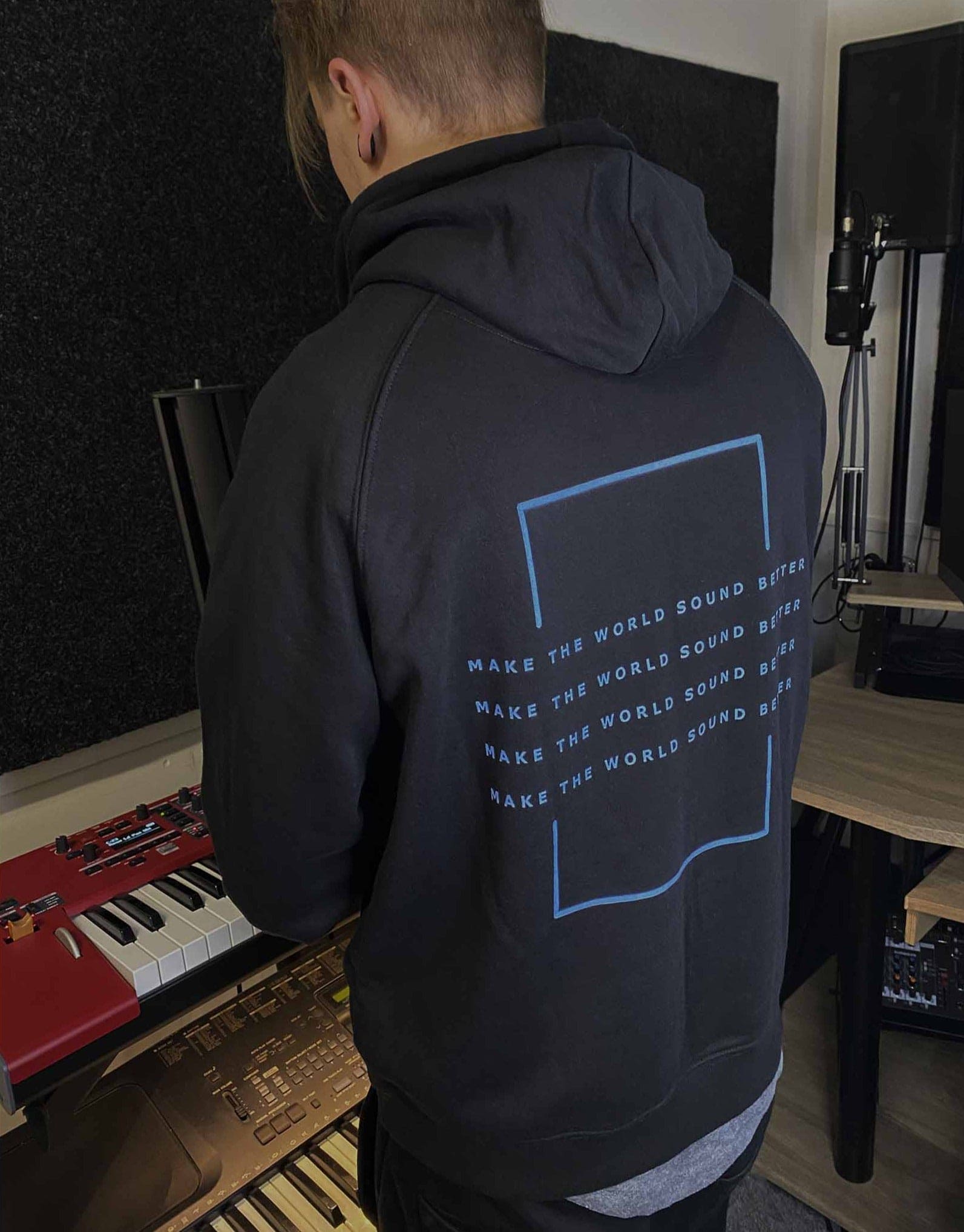 make the world sound better blue print hoodie in use, from the side